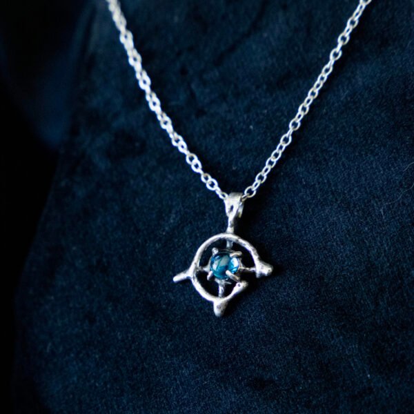 Clutching Spring Pendant